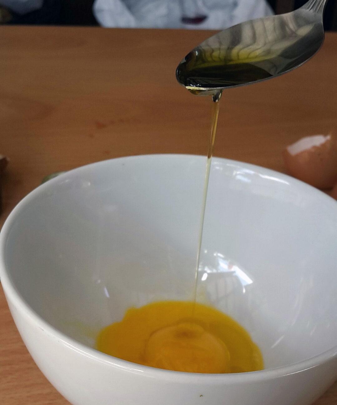 Mixing Olive Oil with Egg Yolk